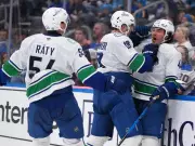 Kiefer Sherwood's Hat Trick Heroics Lead Canucks to Thrilling Shootout Victory Over Blues