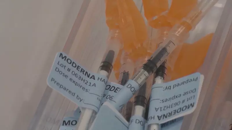 Alberta's COVID-19 Vaccine Rollout Faces Pharmacy Bottlenecks: Long Lines and Limited Supply