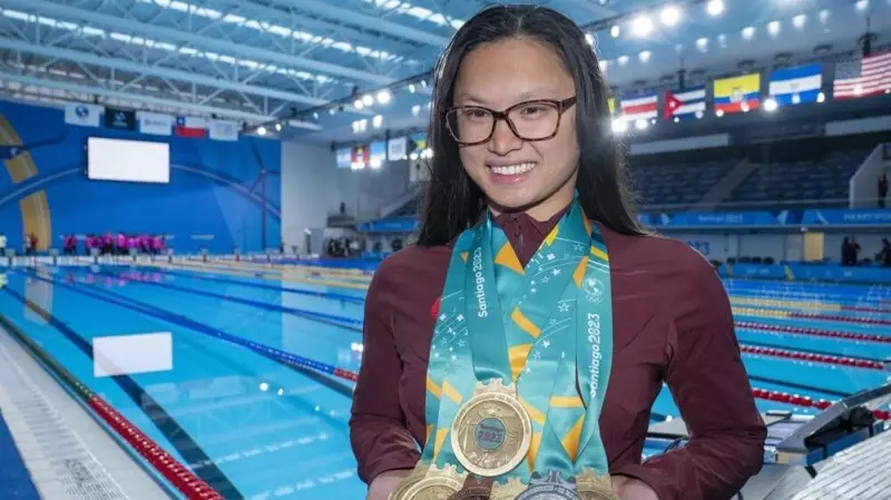 London's Olympic Champion Maggie Mac Neil Enters Sports Hall of Fame, Reflects on Pool's Tranquility