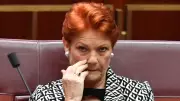 Australian Senator's Burqa Stunt Sparks Outcry in Parliament