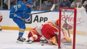 Blues Edge Flames 3-2 as Walker and Binnington Shine