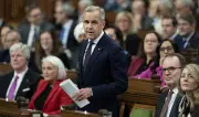 Carney's Budget Passes, Averting Early Election in Canada