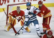 Dustin Wolf's 16-Save Shutout Leads Calgary Flames Past Sharks 2-0