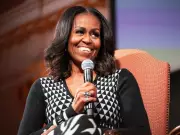 Michelle Obama's Hair Theory Sparks Debate on Swimming and Race