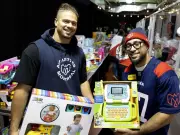 Montreal Alouettes Spread Holiday Cheer at Welcome Hall Mission Toy Giveaway