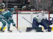 Nikita Tolopilo Shines in Canucks Net, Sparking Goalie Debate