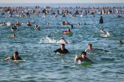 Sydney's Bondi Beach sees sunrise gathering in defiance after massacre