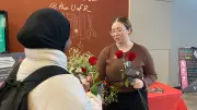 200 Roses Distributed at University of Regina to Honour Montreal Massacre Victims