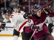 Canada's World Juniors Team Escapes Early Tests, Seeks Dominance