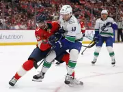 Canucks' Elias Pettersson Injured Before Wild Game, Adding to Team's Woes