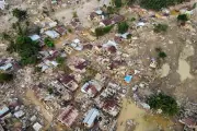 Deadly Asian Floods: Damaged Roads and Debris Hinder Relief Efforts