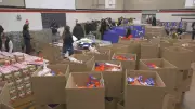 Edmonton Volunteers Pack Hundreds of Holiday Meals for Delivery