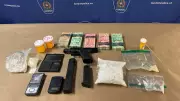 London Police Seize Handgun, Drugs, and Cash in West End Raid