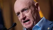 Sen. Mark Kelly's Armed Security Detail Follows Trump's 'Hang' Threats