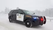 Two hospitalized, driver charged after vehicle rolls into ditch near Barrie
