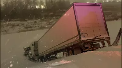 London Firefighters Execute Rope Rescue After Truck Slides into Snowy Ditch on Highway 401