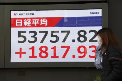 Tokyo Hits Record High, Tracking Wall Street as Global Shares Mixed