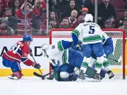 Canucks' Nikita Tolopilo Under Siege in 6-3 Loss to Canadiens Amid Injury Woes