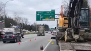 Commercial Truck Carrying Excavator Strikes Overpass on Highway 1 in Surrey