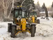 Edmonton's Winter Woes: Residents Criticize Snow Clearing and Mayor's Travel