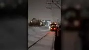 Ottawa LRT Passengers Forced to Walk Tracks After Train Stalls in Snow