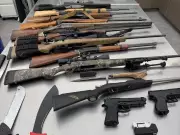 Parkland County man faces 21 charges after RCMP seize firearms, meth, stolen trailers