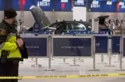 Vehicle Crashes Through Detroit Airport Entrance, Injuring Six People