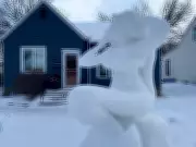 Winnipeg Artist's Towering Mermaid Snow Sculpture Captivates Community