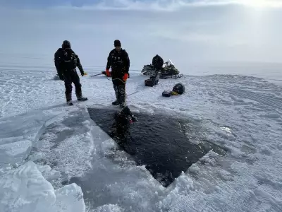 Two Snowmobilers Perish After Falling Through Frozen Lake in British Columbia