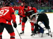 Canada Dominates France 10-2 to Secure Olympic Hockey Quarterfinal Spot