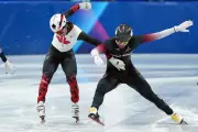 Canada's Women's Hockey Team Opens Olympic Playoffs as Dandjinou Pursues Speed Skating Medal