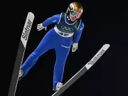 Canadian Ski Jumper Abigail Strate Faces Olympic Setback, Eyes Redemption on Large Hill