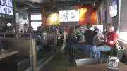 Downtown Edmonton Sports Bar Buzzing with Olympic Hockey Morning Crowd
