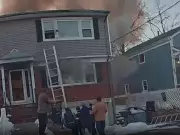 Dramatic Bodycam Footage Shows Police Rescue Family from Burning New York Home