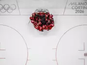 Married Doctors Serve Canadian Hockey Teams at Olympics, Rarely Meet