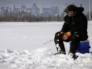 Montreal's Bitter Cold: Ice Fishing Persists Despite Arctic Chill