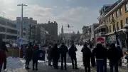 Ottawa Crowds Brave Frigid Temperatures for Snowmobile Freestyle Show in ByWard Market