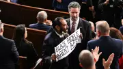 Rep. Al Green Confronts Trump with 'Black People Aren't Apes' Sign at SOTU