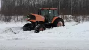 Stolen Tractor Flees Police, Gets Stuck in Alberta Field: One Man Charged