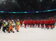 Swiss Star Kevin Fiala Suffers Apparent Leg Injury in Olympic Hockey Clash with Canada