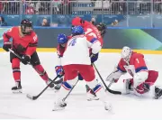 Team Canada Secures 5-1 Victory Over Czechia in Women's Hockey, Loses Captain Poulin to Injury