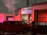 Toronto Firefighter Injured Battling Blaze at Etobicoke Auto Shop
