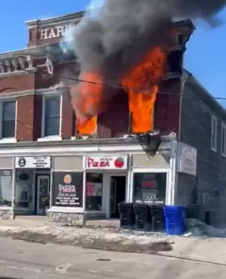 Firefighters Battle Blaze in Downtown Ayr, Ontario, as Crews Respond to Emergency
