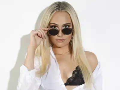 SUNshine Girl Sunny: University Student with Dreams of Psychology and a Red Corvette