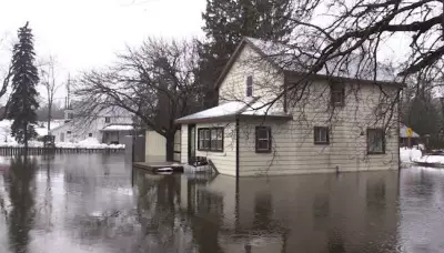 Temporary Dam Built to Protect Pinkerton Homes After Earthen Dam Failure