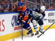 Adam Henrique Embraces Defensive Role Amid Scoring Drought, Aims for Comeback