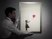 Banksy's Identity Allegedly Uncovered by Reuters Investigation, Legal Team Disputes Claims