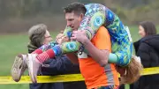 Couples Conquer Quirky U.K. Wife Carrying Race, Inspired by Finnish Legend
