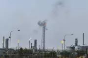 Iran Strikes Kuwait Refinery, Israel Kills Guards Spokesman Amid Escalating Conflict
