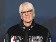 John Tesh Reveals Ongoing 10-Year Battle with Rare Cancer, Credits Wife for Survival